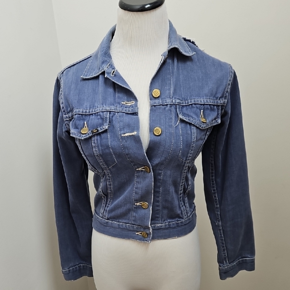 Distressed Vintage Top Blue Cropped Jean Jacket with Contrasting Stitching.